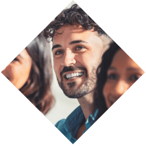 Close up portrait of smiling man with beard attending a CentralSquare seminar